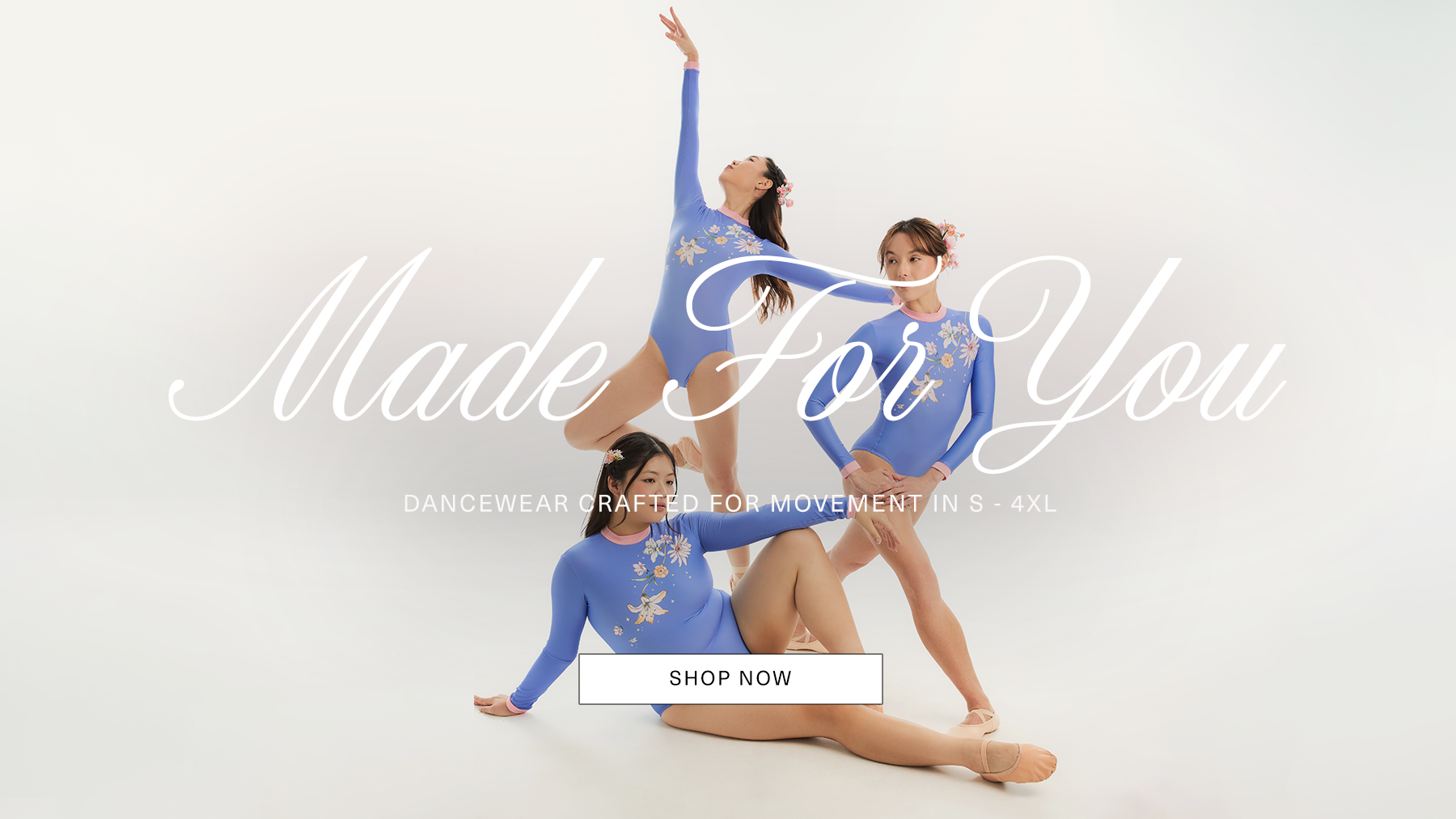 Two dancers in blue outfits posing on a white background with 'Made For You' text.